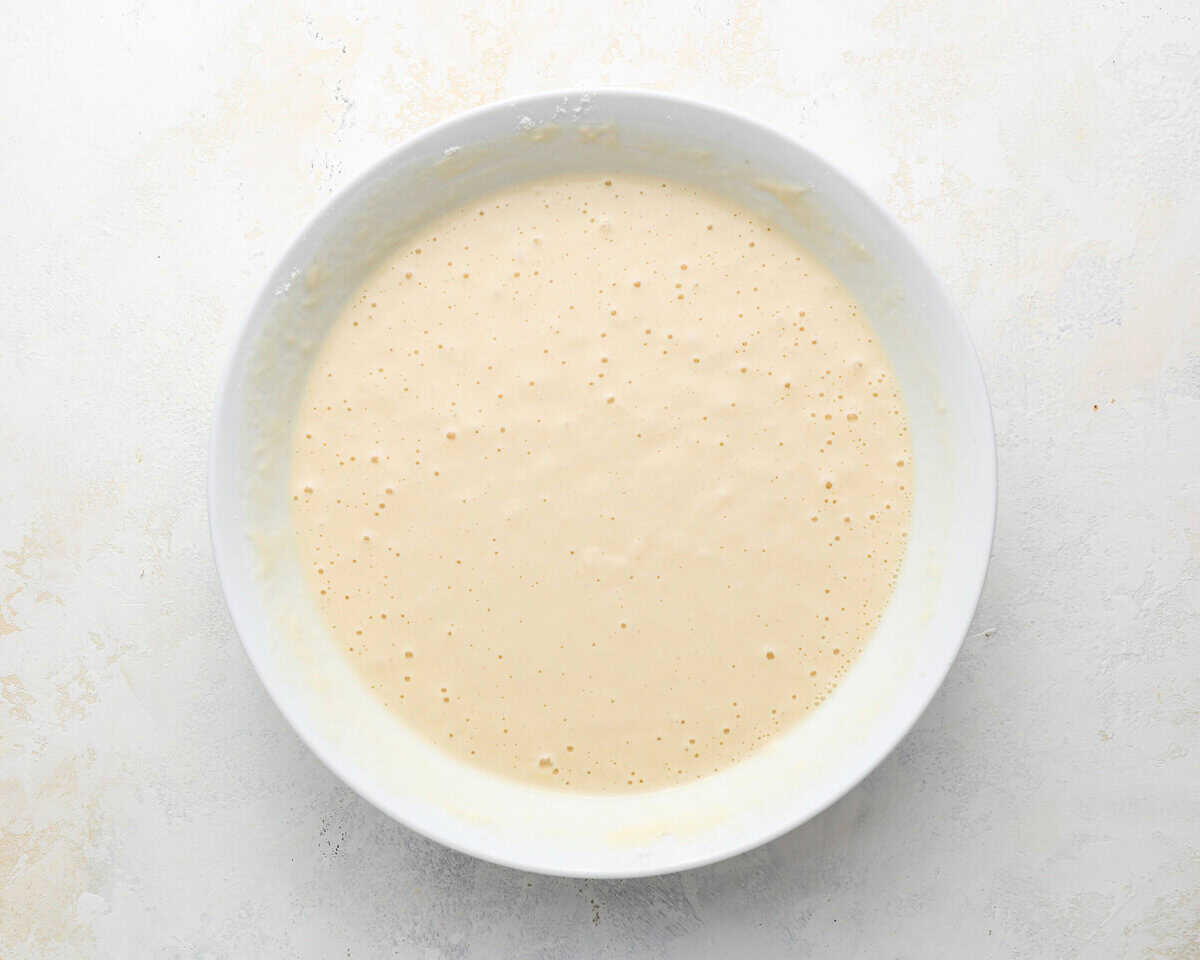 Beer batter whisked until smooth and slightly bubbly in a shallow bowl.