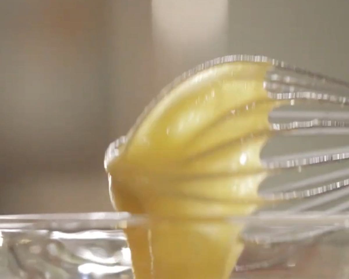 Whisking smooth lemon filling mixture for gluten-free lemon bars