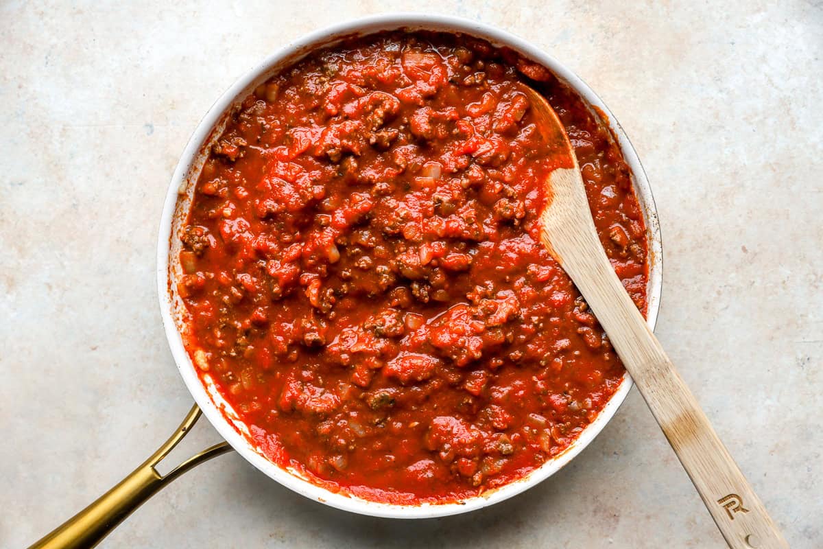 marinara sauce for Italian stuffed shells simmering