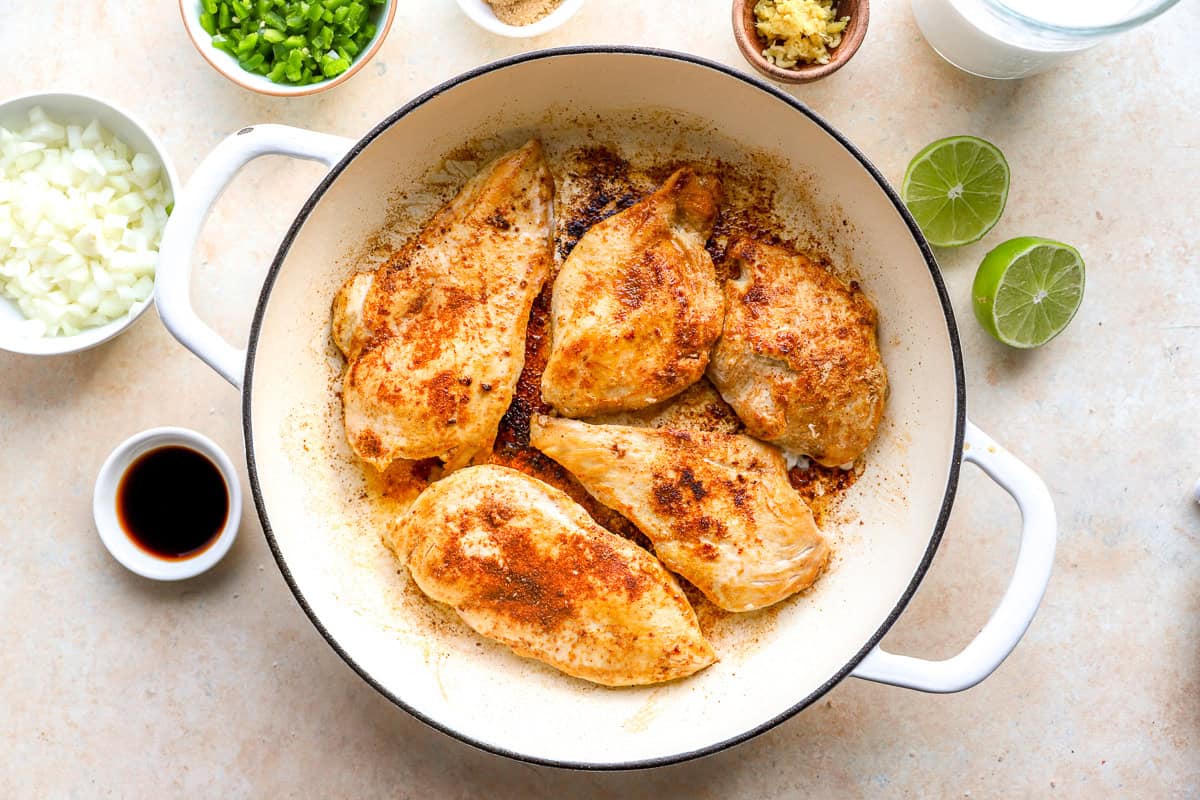 chicken searing in a pot