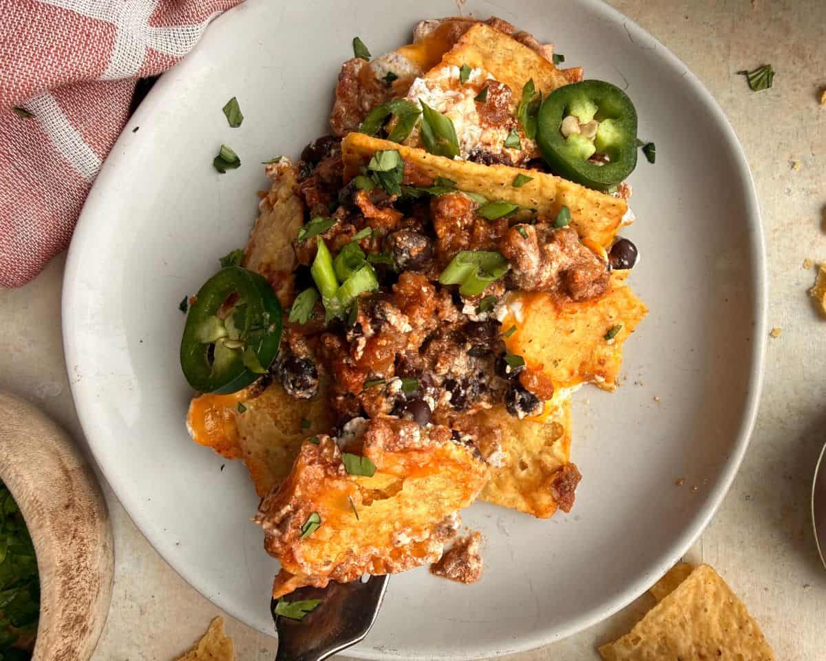 finished nacho pie on a plate