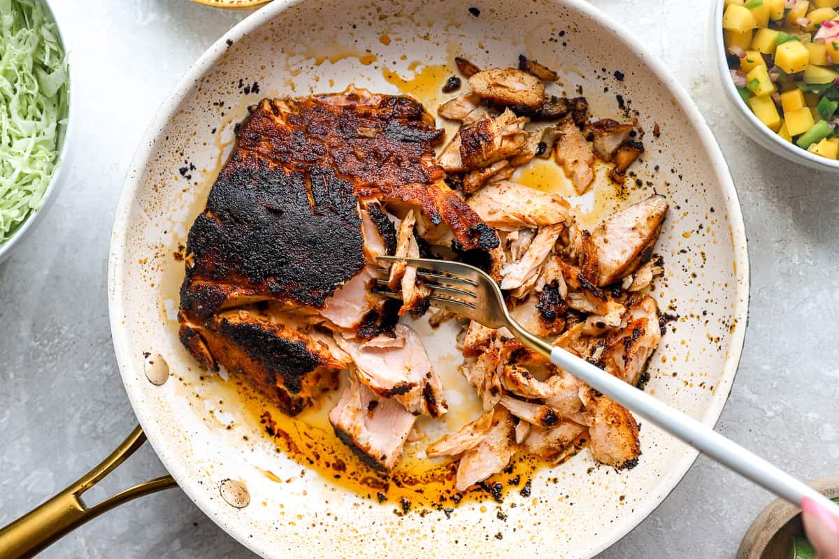 cooking salmon in a skillet