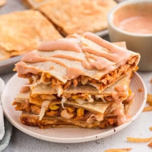 bbq chicken crunch wraps stacked with sauce