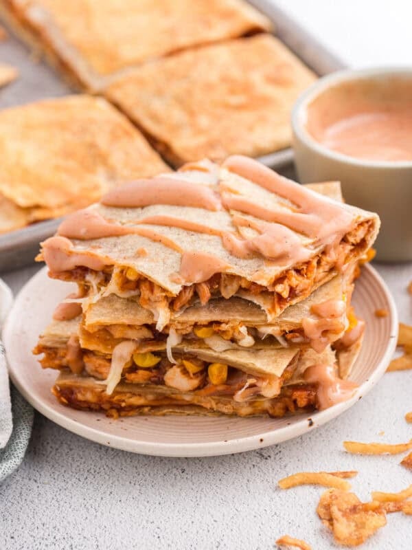 bbq chicken crunch wraps stacked with sauce