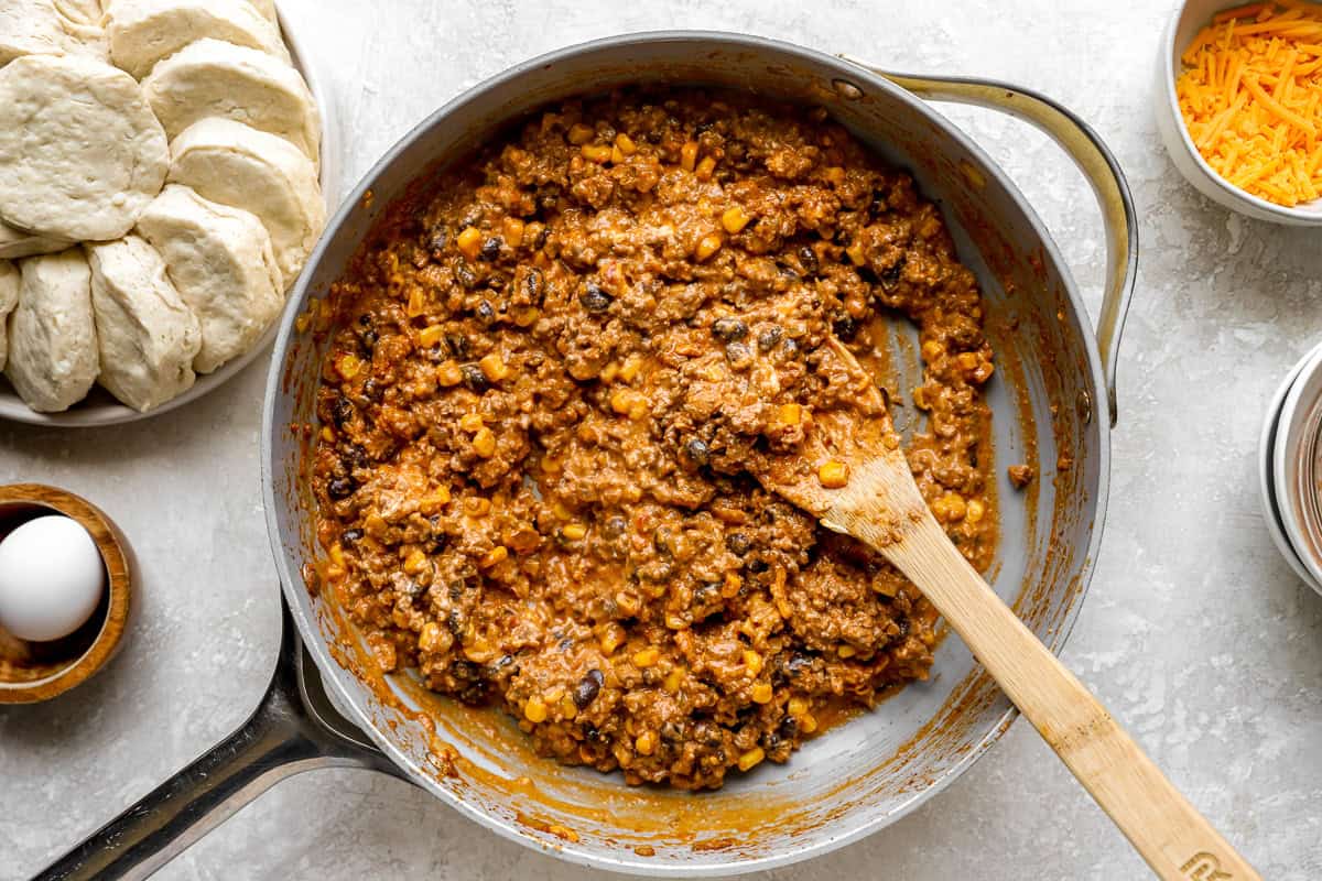 Creamy taco filling with melted cream cheese stirred into the ground beef, corn, and black bean mixture.